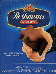 Smoking was heavily promoted in magazines in the 1980s. The different brands tried to encourage different aspirational lifestyles but fundamentally each was promoting, and profiting from, tobacco addiction. However the inserted image of breasts is asking a more fundamental question relating to seeking extra comfort where infantile act of thumb sucking is in turn a substitute for the mothers nipple during breast feeding.